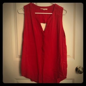 Red sleeveless blouse